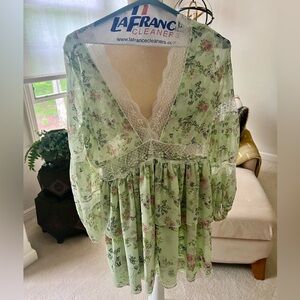 NWOT!  Never worn!  Pale green, floral and lace tissue dress.  Size M.